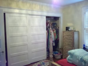 BEFORE Picture - Entire wall of closet doors